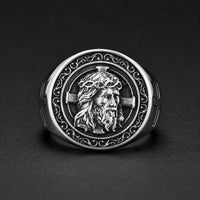 Bague Croix de Jésus en acier inoxydable avec visage du Christ et détails argentés