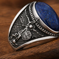 Bague Éclat de Nuit de l'Archange en acier inoxydable avec détail latéral et pierre bleue
