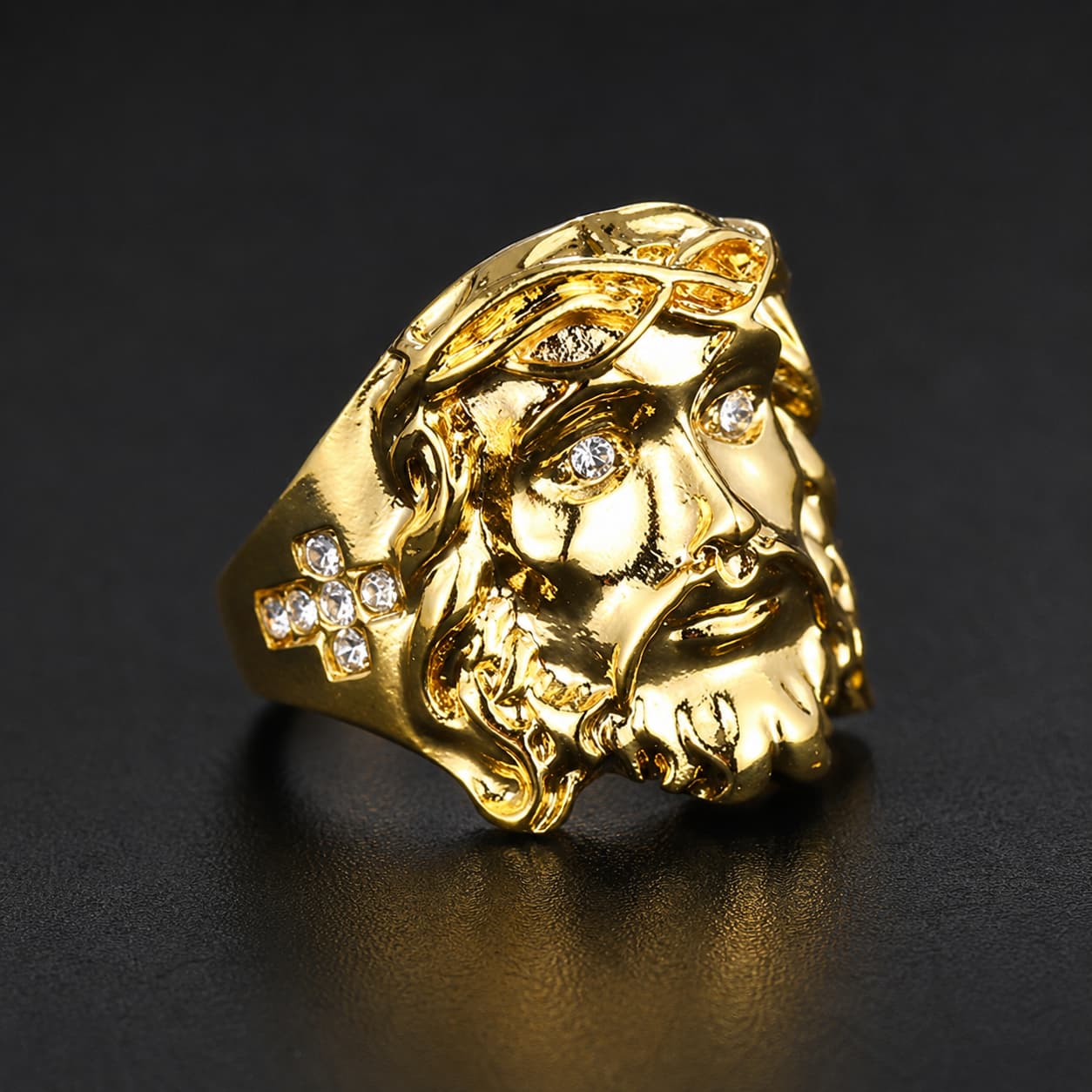 Bague Foi en Christ en acier inoxydable doré avec visage du Christ et strass sur fond noir