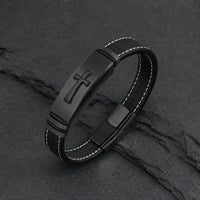 Bracelet de la Croix Sacrée en cuir véritable noir avec plaque noire sur fond anthracite texturé