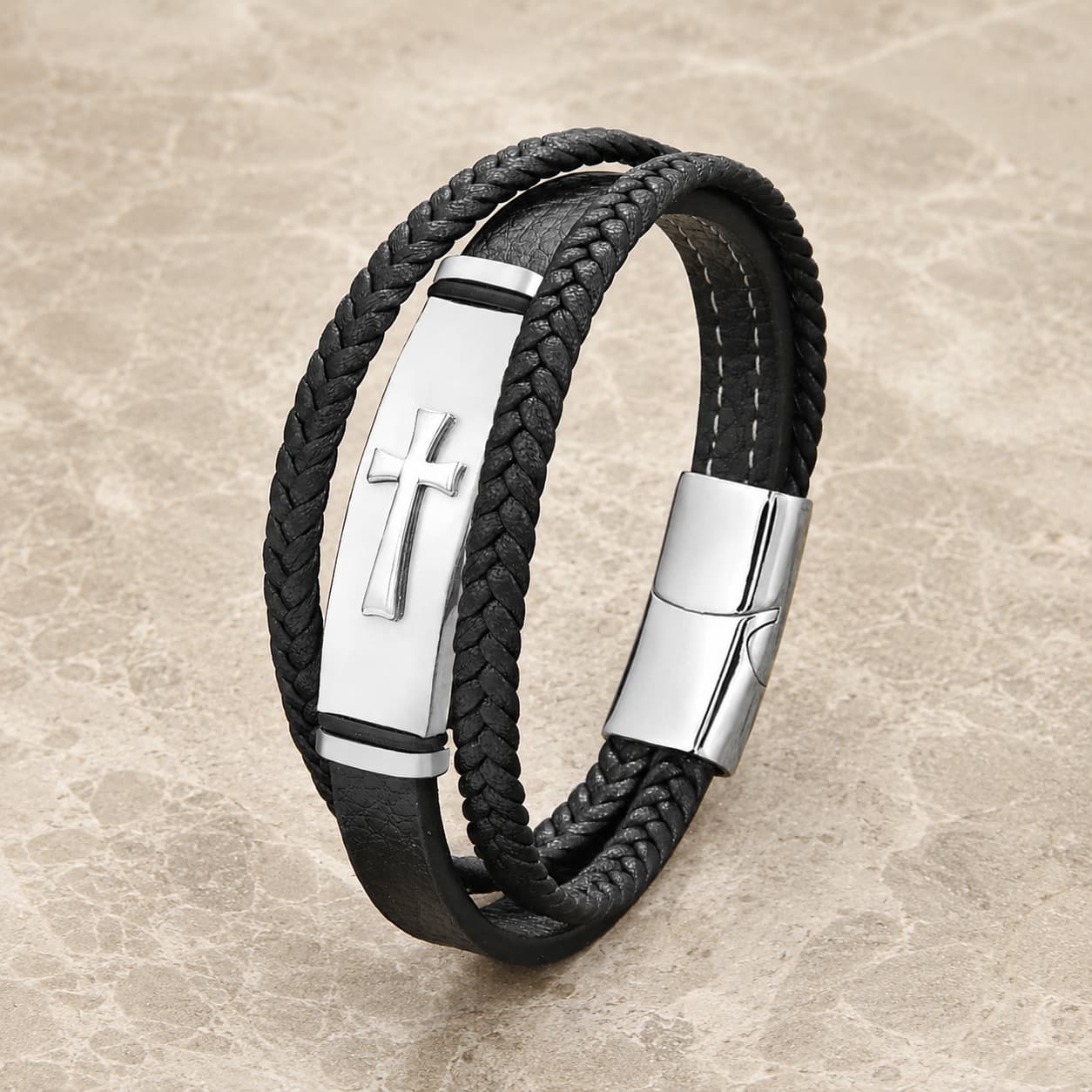 Bracelet de la Croix Sacrée en cuir véritable noir et acier inoxydable argenté sur pierre médiévale claire