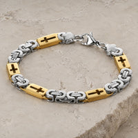 Bracelet de l’Espoir Croisé en acier inoxydable avec maillons or et argent sur pierre médiévale claire