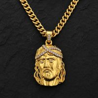 Collier de la Foi du Christ en acier inoxydable doré sur fond anthracite texturé ardoise sombre
