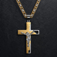 Variante or et argent du collier de la Foi Sacrée en acier inoxydable avec crucifix sur fond anthracite texturé